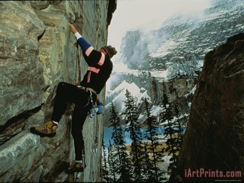 Raymond Gehman A Climber Ascends The Quartzite Cliffs at The End of Lake Louise Art Painting