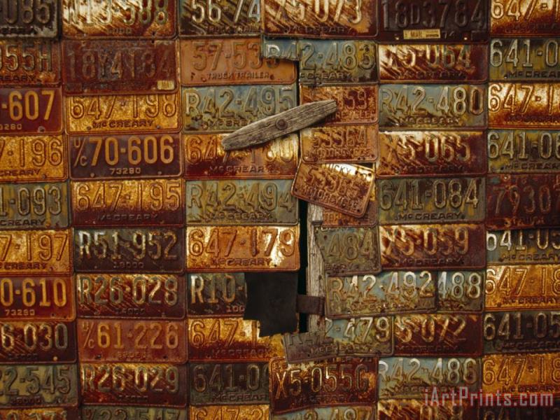 Raymond Gehman Side of a Building Adorned with Old License Plates Art Print