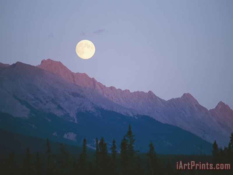 Raymond Gehman The Full Moon Over Mountains Lit by Low Sunlight Art Print