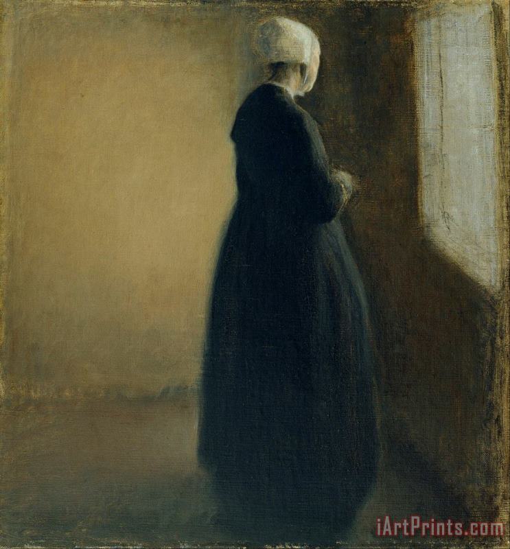 An Old Woman Standing by a Window painting - Vilhelm Hammershoi An Old Woman Standing by a Window Art Print