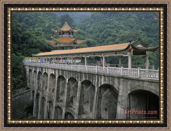 Raymond Gehman An Ornate Covered Bridge Over a Gorge on Dinghu Mountain Framed Print