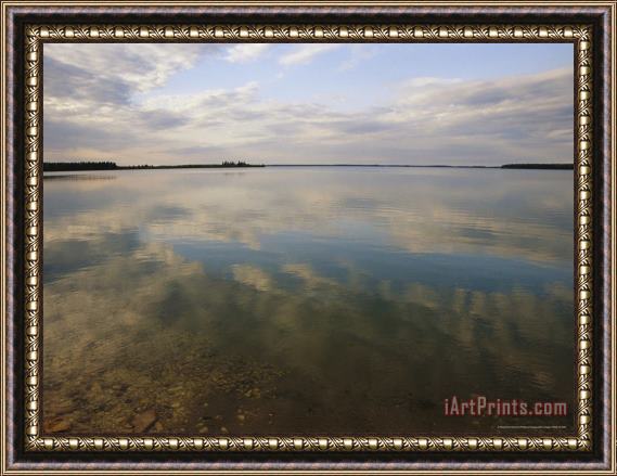 Raymond Gehman Clouds Reflected on The Smooth Waters of Iskwasum Lake Framed Painting