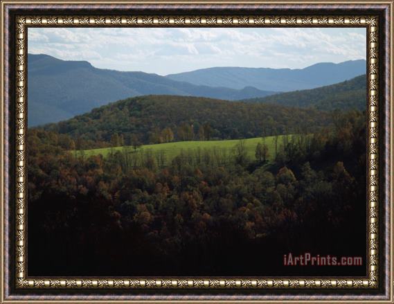 Raymond Gehman Field in Foothills Surrounded by Mountain Ridges Framed Print