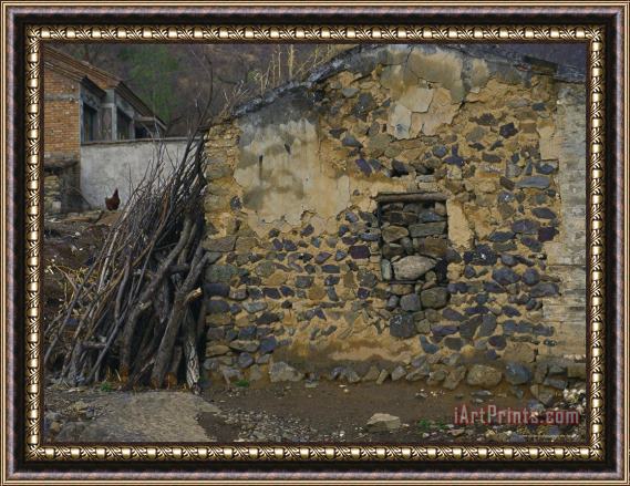 Raymond Gehman Firewood Stacked Against a Village Farmhouse Near Beijing Framed Print