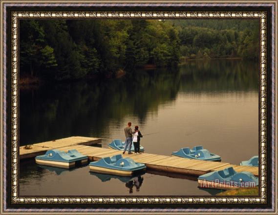 Raymond Gehman Man And Woman Enjoying Fishing From a Pier at Pipestem State Park Framed Print