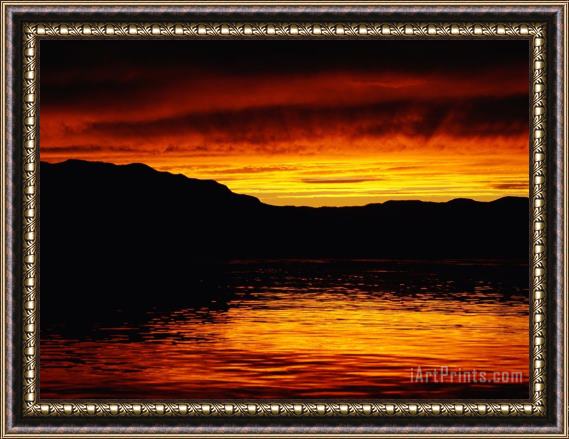 Raymond Gehman Vivid Sunset Over The Mckenzie River Framed Print