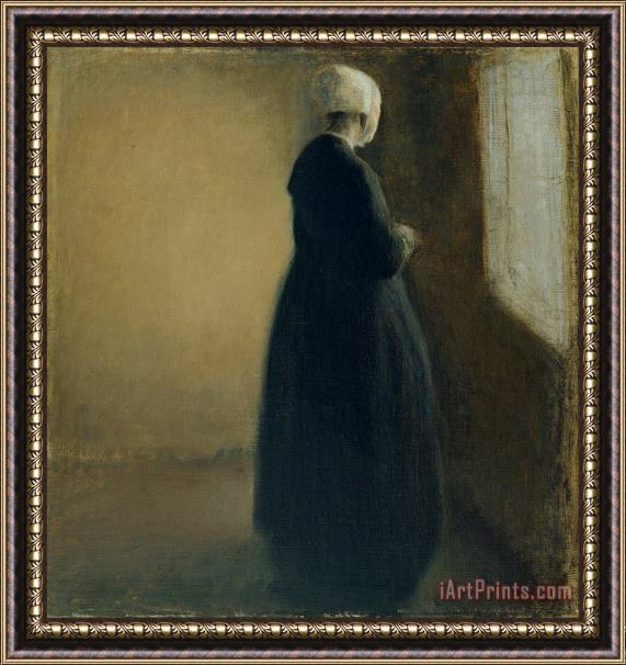 Vilhelm Hammershoi An Old Woman Standing by a Window Framed Print