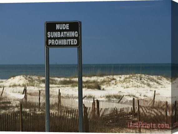 Raymond Gehman A Sign on a Public Beach Warns of No Nude Sunbathing Stretched Canvas Print / Canvas Art