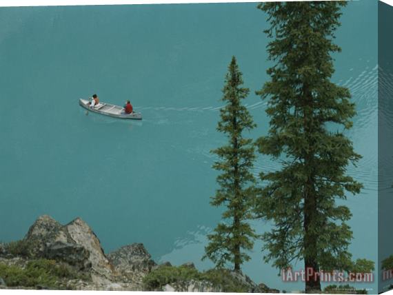 Raymond Gehman Canoeists on Moraine Lake Stretched Canvas Print / Canvas Art