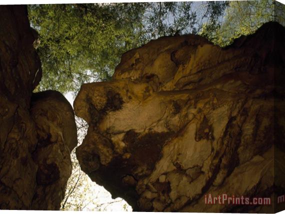 Raymond Gehman Looking Up at Large Over Hanging Boulders in a Wooded Setting Stretched Canvas Print / Canvas Art