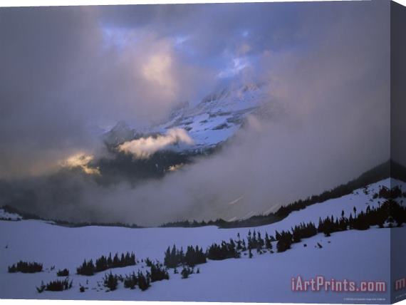 Raymond Gehman Snow And Clouds Fill The Valley at The Garden Wall in Logan Pass Stretched Canvas Painting / Canvas Art