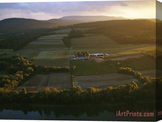 Raymond Gehman Sunset Over a Farm on The Susquehanna River Stretched Canvas Print / Canvas Art