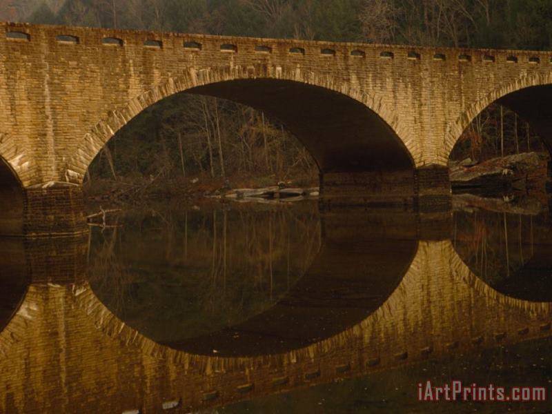 Highway Bridge And Its Reflection in The Cumberland River painting - Raymond Gehman Highway Bridge And Its Reflection in The Cumberland River Art Print
