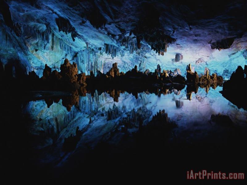 Inside Reed Flute Cave Illuminated in Blue Light painting - Raymond Gehman Inside Reed Flute Cave Illuminated in Blue Light Art Print