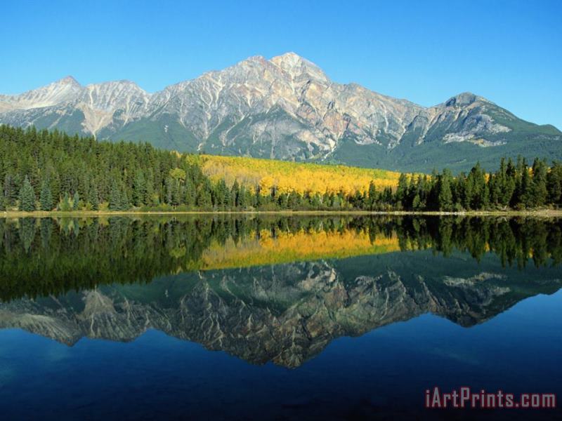 Raymond Gehman Trees And Mountains Reflected in a Still Lake Art Print