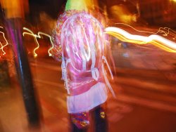 Raymond Gehman Young Person in Colorful Garb Walking a San Francisco Street at Night