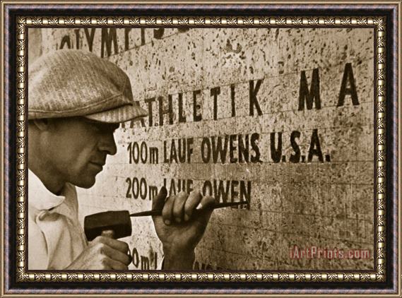 American School Carving the name of Jesse Owens into the champions plinth at the 1936 Summer Olympics in Berlin Framed Painting