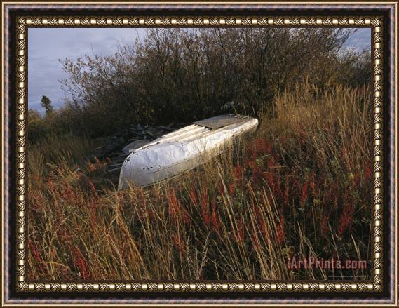 Raymond Gehman A Boat Rests Upside Down on The Shore of The Mackenzie River Framed Painting