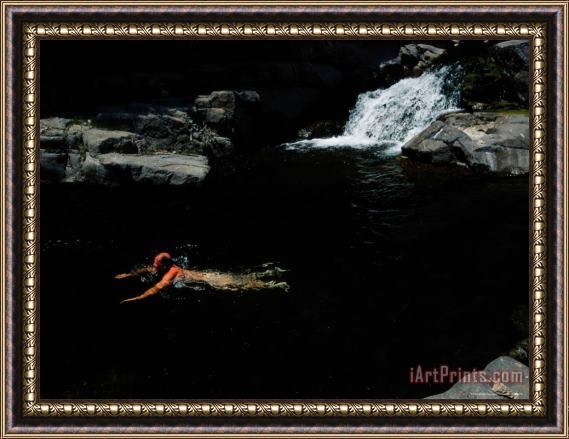 Raymond Gehman A Man Taking a Dip in a Creek Fed Pool in The Gila Wilderness Area Framed Painting