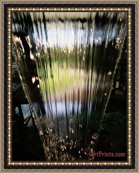 Raymond Gehman A Sheet of Water Cascading Down an Indoor Waterfall Framed Painting