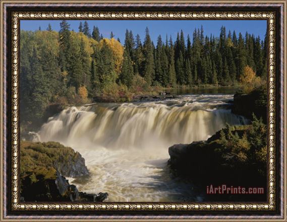 Raymond Gehman A Time Exposure of a Waterfall Cascading by a Forest During Autumn Framed Painting