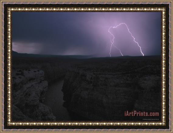 Raymond Gehman A View of a Lightning Strike From Devils Canyon Overlook Framed Print