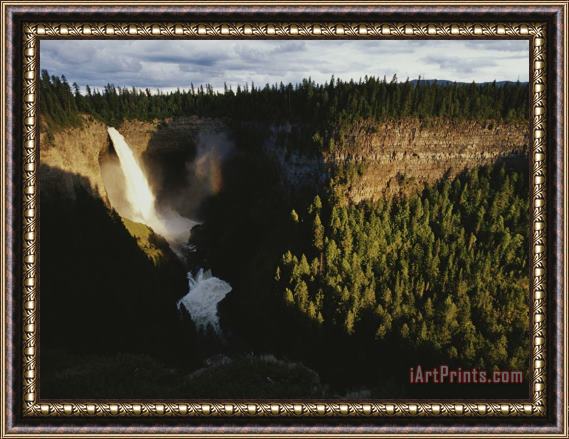 Raymond Gehman A Waterfall Spills Into a Deep Canyon Surrounded by Forest Framed Painting
