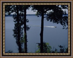 Fishing Boats in a Calm Sea Framed Prints - Boat Zipping Through The Calm Waters of Kentucky Lake by Raymond Gehman