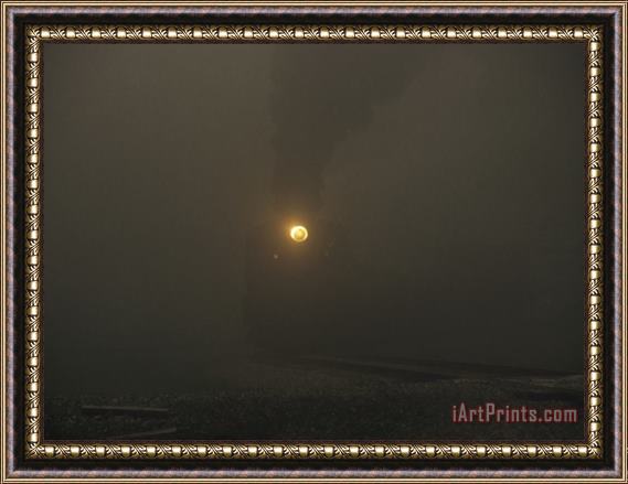 Raymond Gehman Dim View of The Cass Scenic Railroad Train on a Foggy Morning Framed Painting