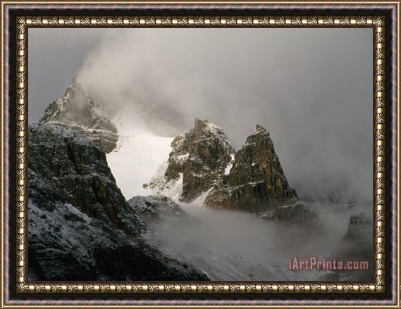 Raymond Gehman Mount Geikie Elevation 10 729 Feet Is Lost in The Clouds And Snow Framed Print