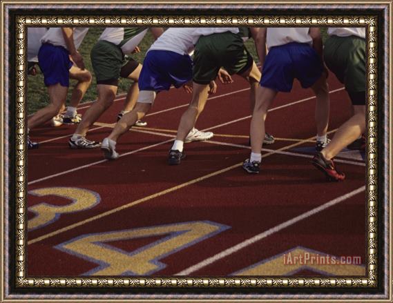 Raymond Gehman Runners Lined Up on a Track Ready for The Starting Gun Framed Print