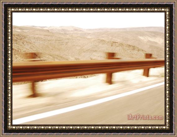 Raymond Gehman Speeding Past a Guard Rail Through Death Valley National Park Framed Print