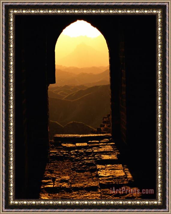 Raymond Gehman Sunlight Streams Through a Doorway in The Great Wall Framed Print