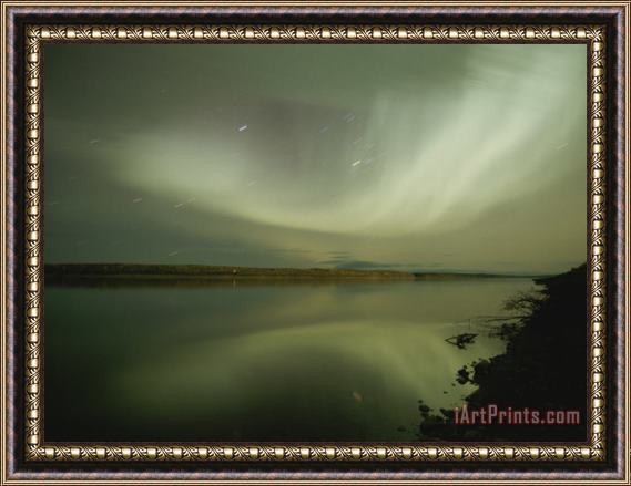 Raymond Gehman The Aurora Borealis Puts on a Light Show Above The Mackenzie River Framed Print