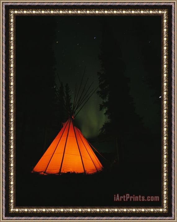 Raymond Gehman The Glow From a Campfire Makes a Shadow on a Tepee Framed Painting