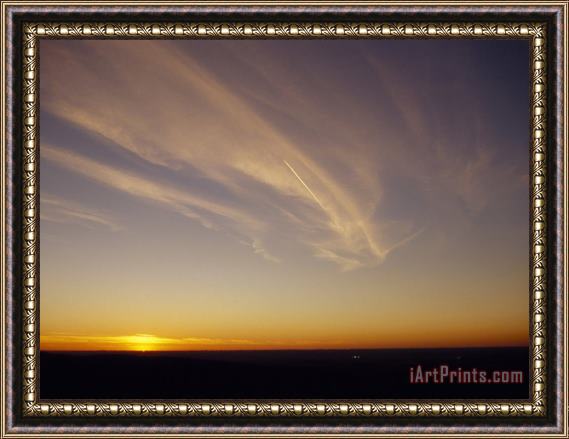 Raymond Gehman Wispy Clouds And Jet Vapor Trail in The Sky at Sunset Framed Painting