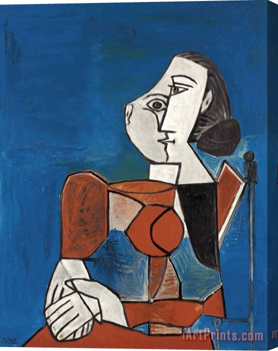 Pablo Picasso Femme Assise En Costume Rouge Sur Fond Bleu Stretched Canvas Print / Canvas Art