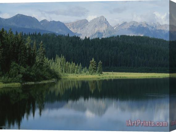 Raymond Gehman A Beautiful Mountain Scene Reflected in a Peaceful Mountain Lake Stretched Canvas Print / Canvas Art