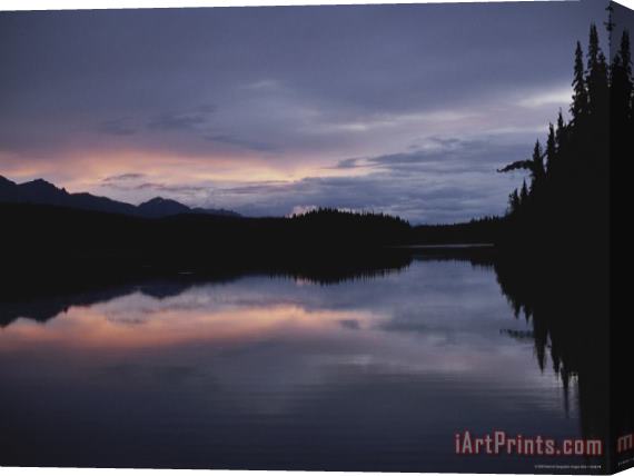Raymond Gehman A Beautiful Twilight Scene Reflected in Peaceful Water Stretched Canvas Print / Canvas Art