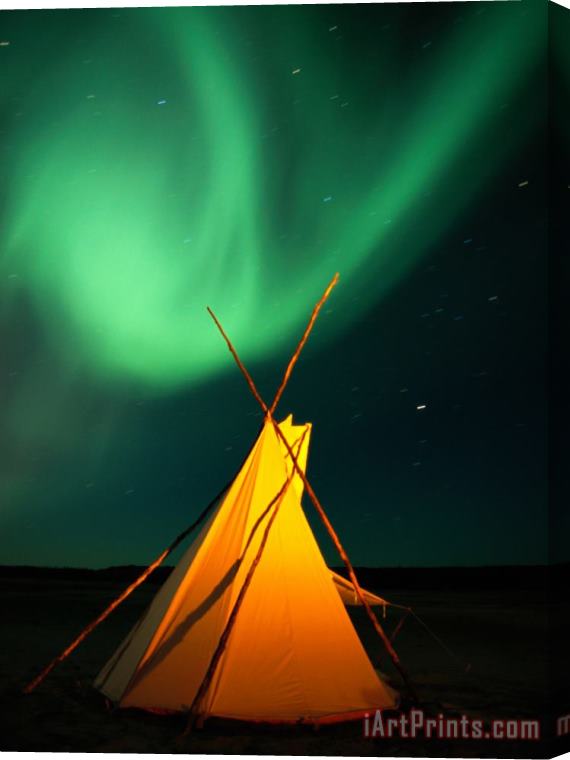 Raymond Gehman A Solitary Tepee Is Illuminated by The Aurora Borealis Stretched Canvas Painting / Canvas Art