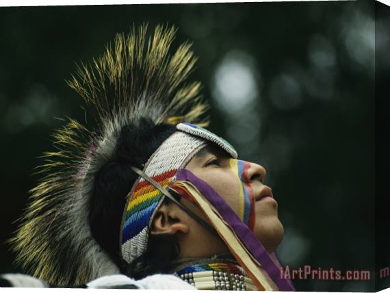 Raymond Gehman A Stoney Indian Brave Wears Ceremonial Headgear During a Festival Stretched Canvas Print / Canvas Art