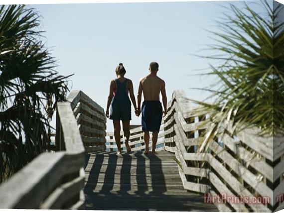 Raymond Gehman Couple Strolling Hand in Hand on The Boardwalk Stretched Canvas Painting / Canvas Art