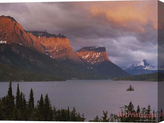 Raymond Gehman Dawn Strikes The Mountains Rising Above St Mary Lake Stretched Canvas Print / Canvas Art
