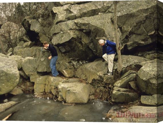 Raymond Gehman Hikers Climb a Rock Formation on Great Falls Billy Goat Trail Stretched Canvas Painting / Canvas Art
