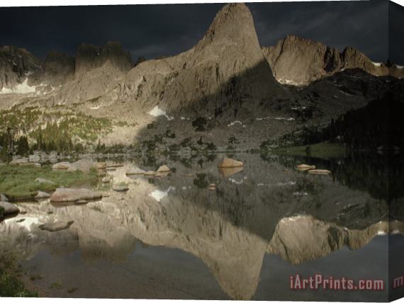 Raymond Gehman Lonesome Lake Mirrors The Play of Light And Shadow on Pingora Peak in The Cirque of The Towers Stretched Canvas Painting / Canvas Art