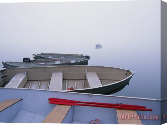 Raymond Gehman Morning Fog on Lake Mcdonald Keeps Rowboats at Anchor Stretched Canvas Print / Canvas Art