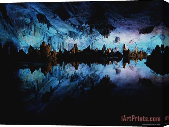 Raymond Gehman Reed Flute Cave Illuminated in Blue Light Stretched Canvas Print / Canvas Art