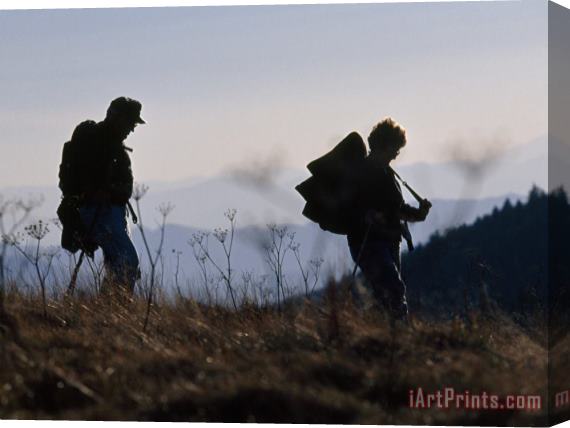 Raymond Gehman Silhouetted Hikers at Twilight on The Appalachian Trail Stretched Canvas Print / Canvas Art