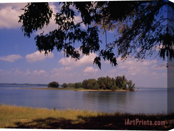 Raymond Gehman Small Island in Kentucky Lake Framed by Tree Branches Stretched Canvas Print / Canvas Art