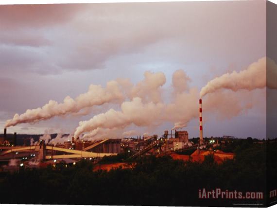 Raymond Gehman Steam And Smoke Billow Out of Chimneys at an Industrial Plant Stretched Canvas Print / Canvas Art